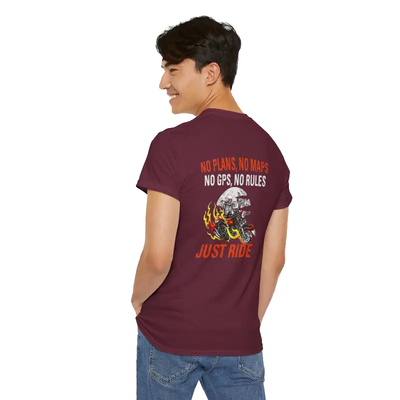 A person wearing a maroon t-shirt with text and graphics printed on the back.
