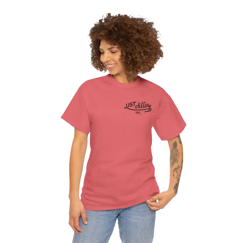 A woman with curly hair wearing a red t-shirt with the text "JUST KILLING INC." printed on it.