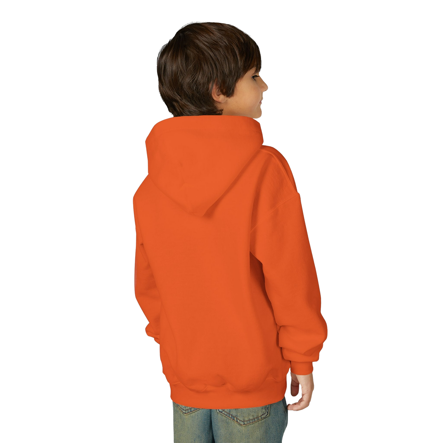 A young boy wearing an orange hoodie stands against a black background.