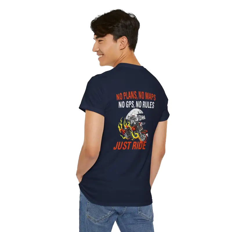 A person wearing a navy blue t-shirt with a graphic design and text printed on the back.