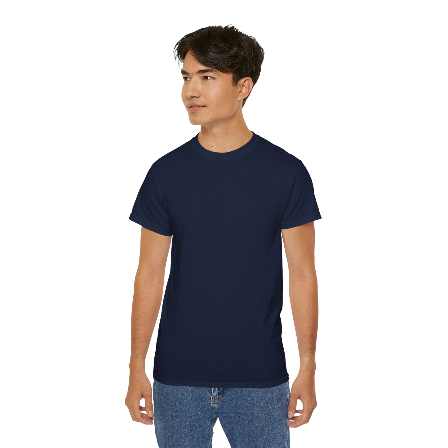 A young man wearing a navy blue t-shirt and blue jeans stands against a black background.