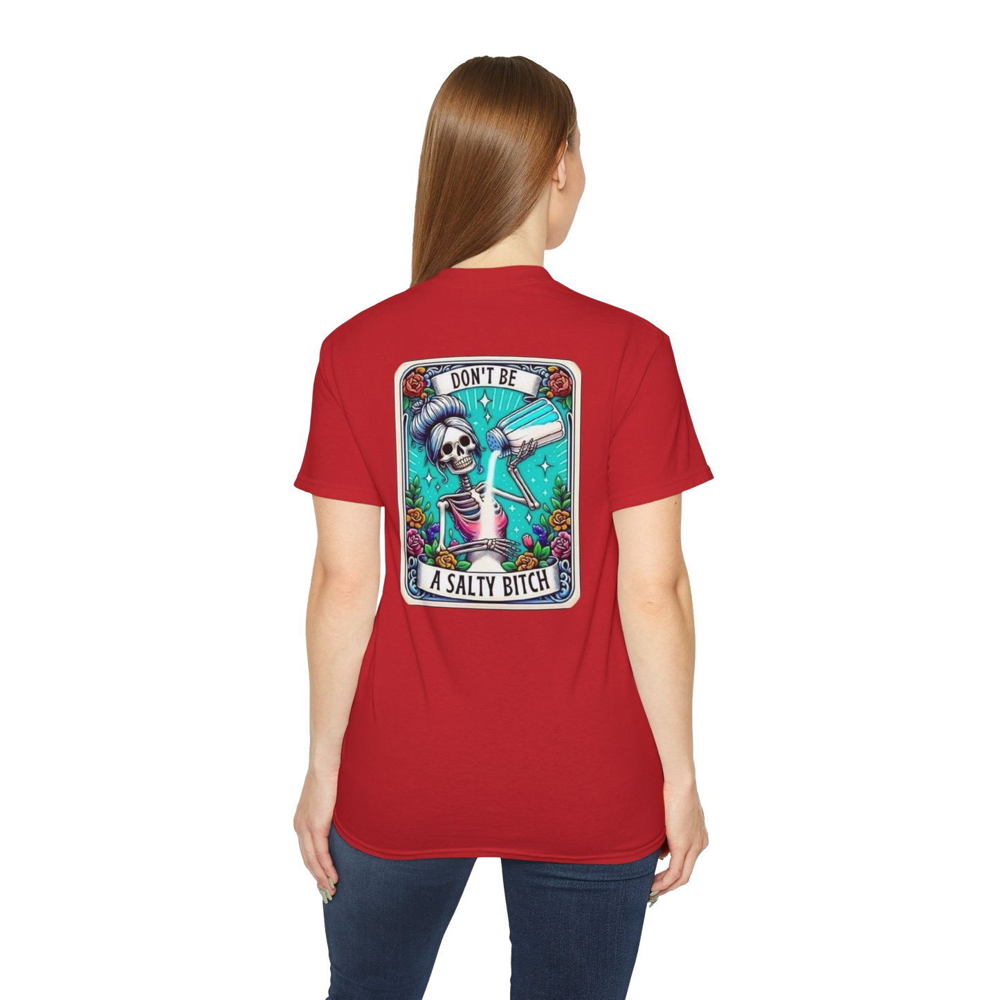A woman wearing a red t-shirt with a graphic design on the back.