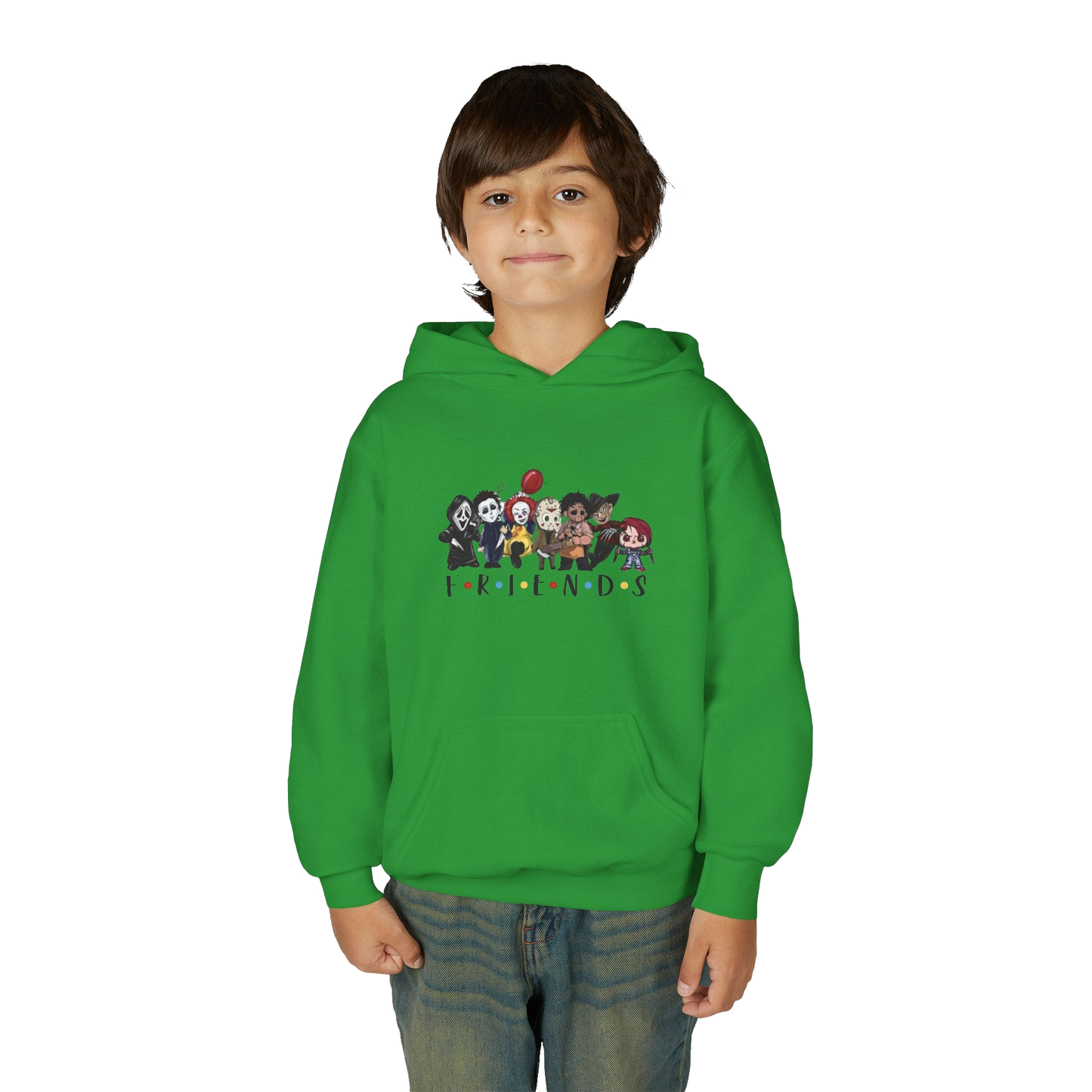 A young boy wearing a green hoodie with a graphic of cartoon characters on it.