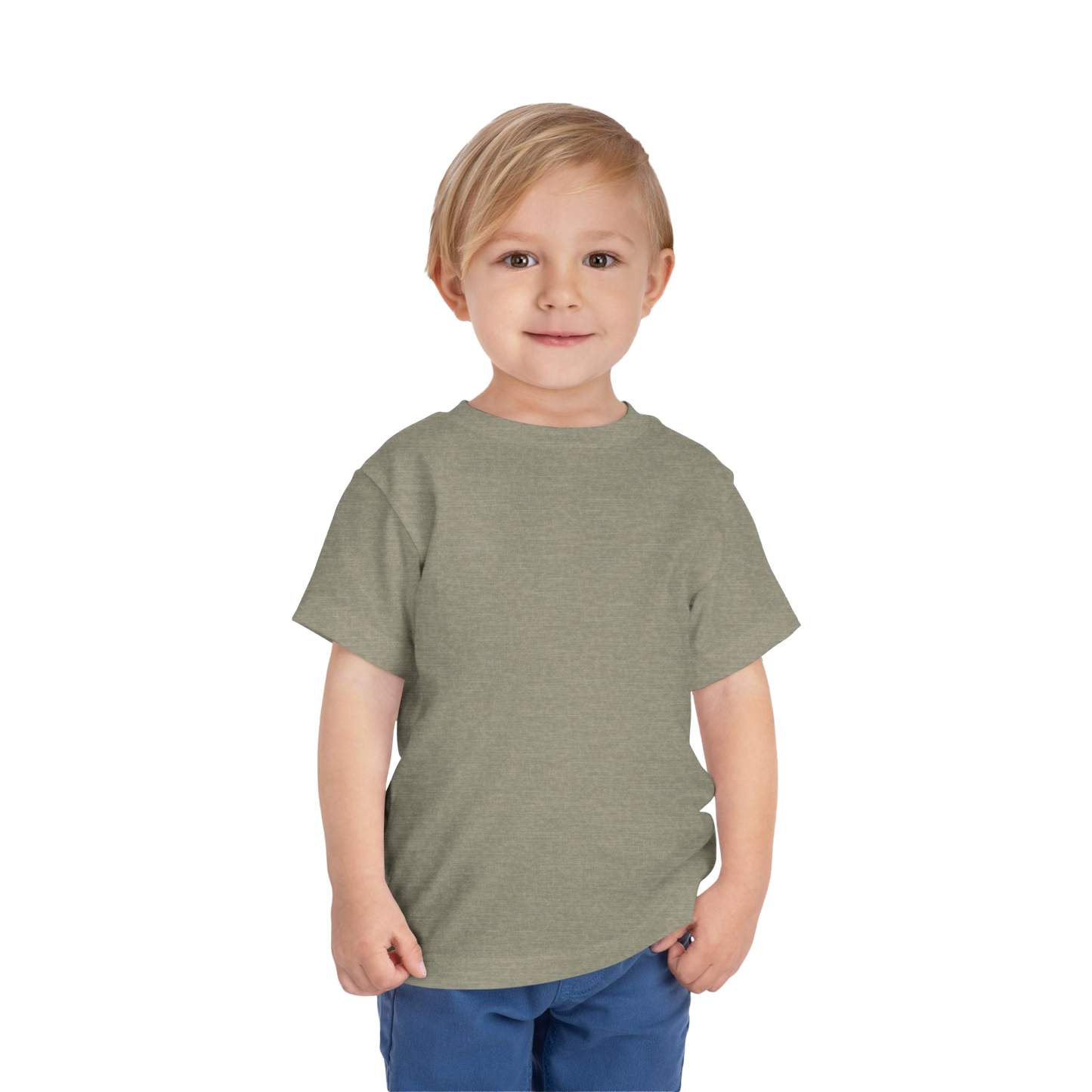 A young boy with blonde hair is smiling and standing against a black background.