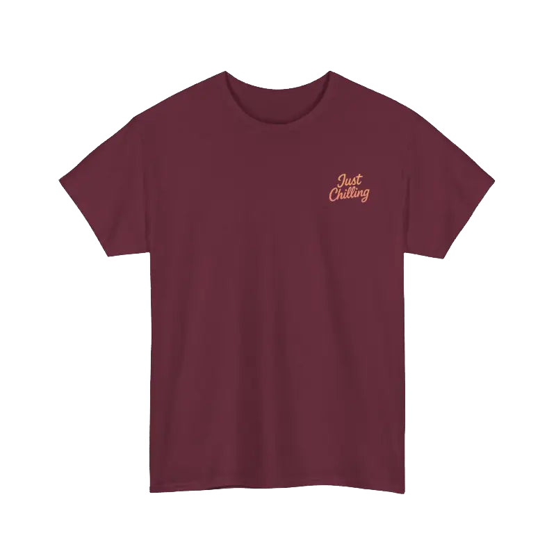 A maroon t-shirt with a small embroidered logo on the left side that says "Just Chilling".