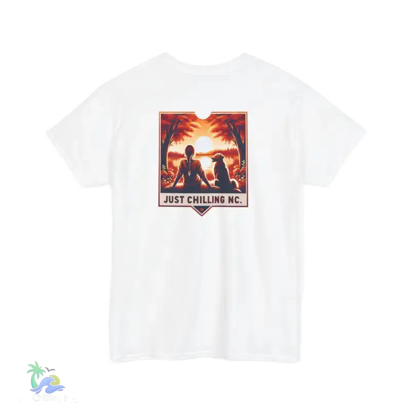 A white t-shirt with a graphic design depicting two people sitting in a relaxed pose, with a sunset in the background. The text "JUST CHILLING NC" is displayed below the image.