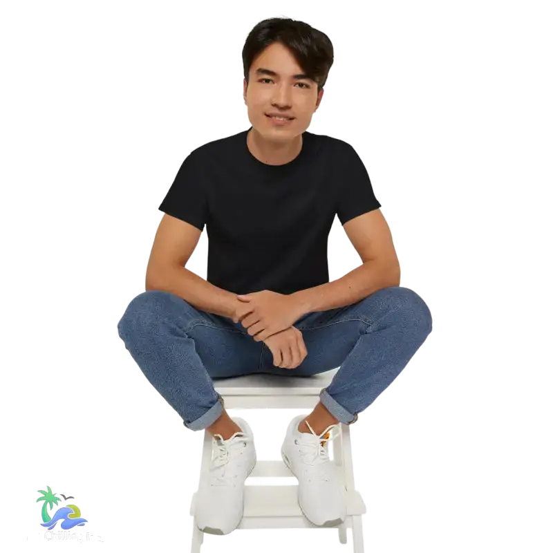Man in black t-shirt and jeans.