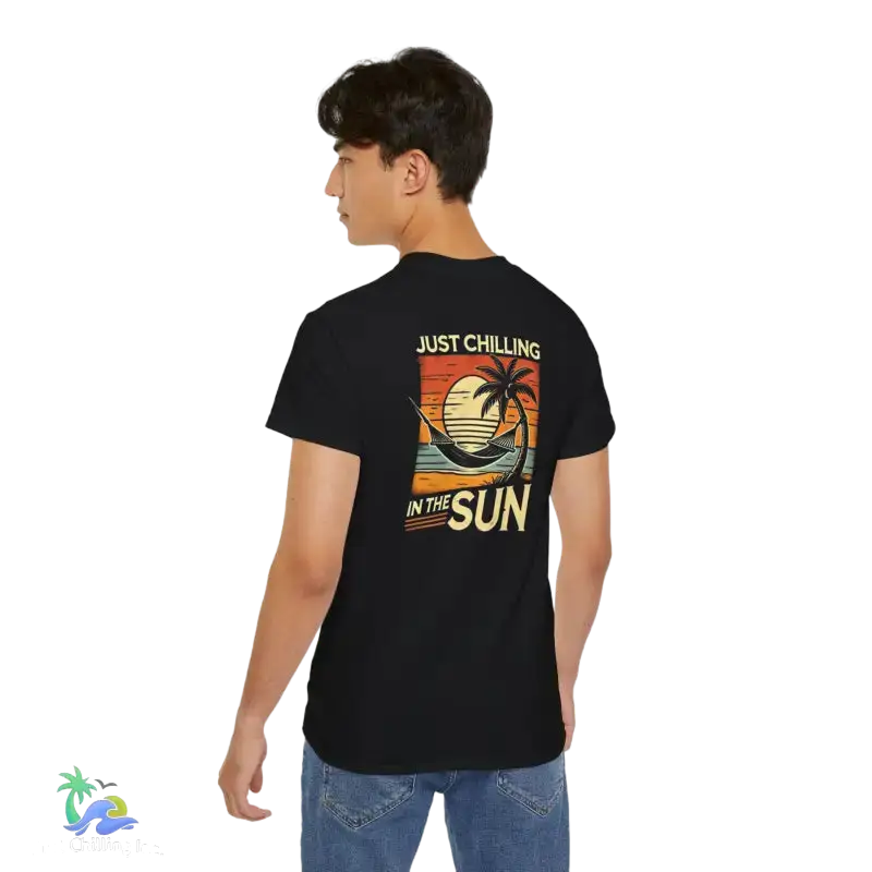Black t-shirt with beach graphic.