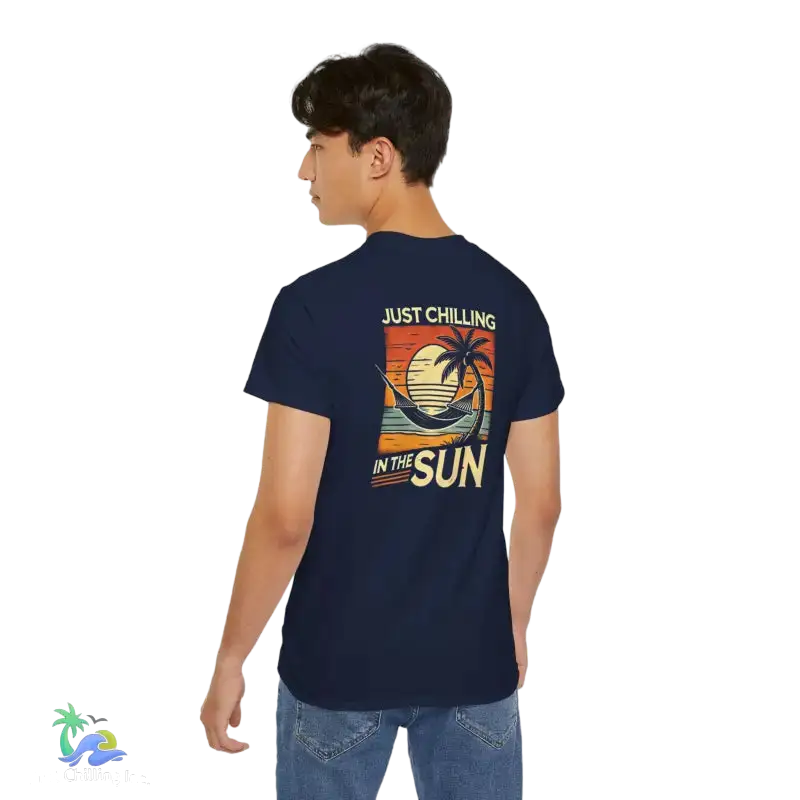 Navy t-shirt with beach graphic.