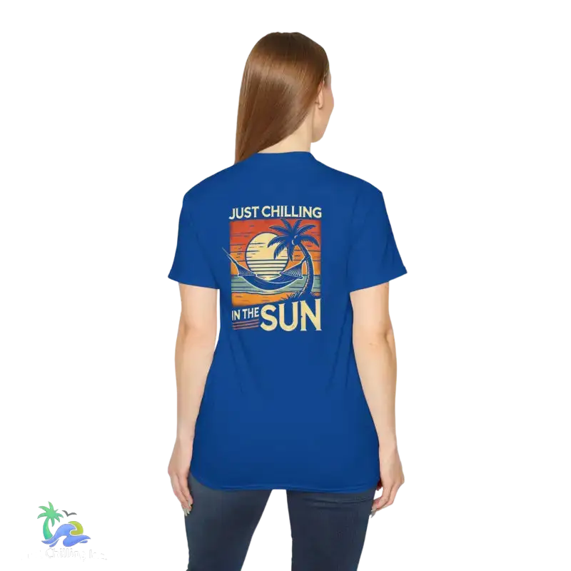 Blue t-shirt with beach graphic.
