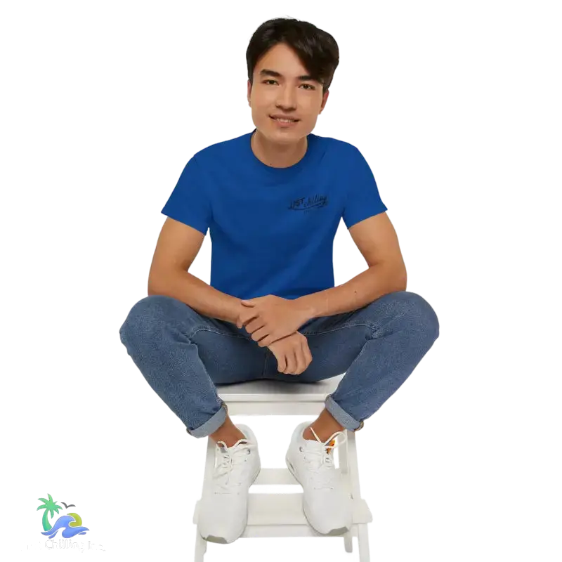 Blue t-shirt with a small design.
