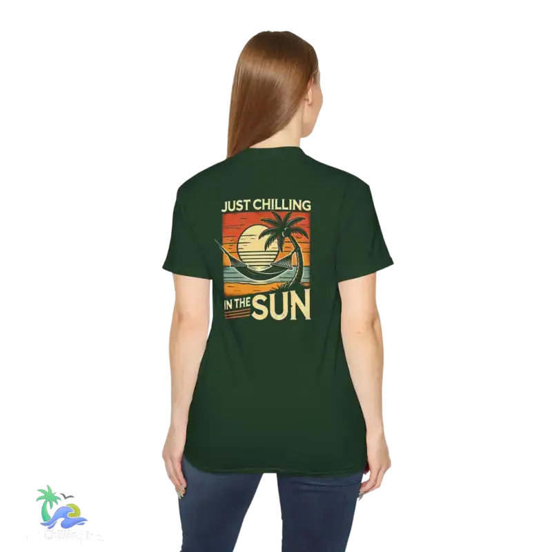 Green t-shirt with beach graphic.