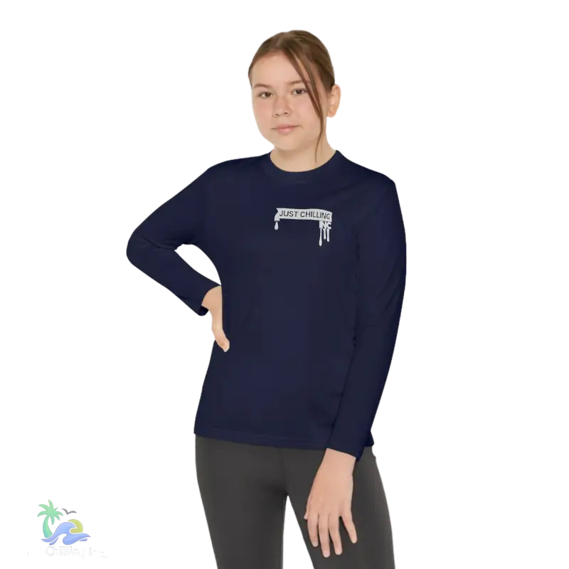 a woman wearing a dark blue shirt with a white logo on it