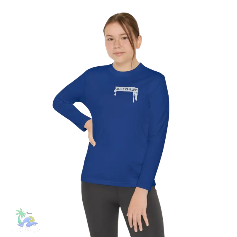 a woman wearing a blue shirt with a white logo on it