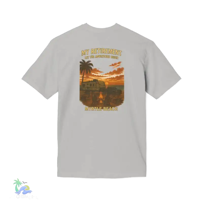 A white t-shirt with a graphic design depicting a sunset scene with palm trees and a vehicle in the background.