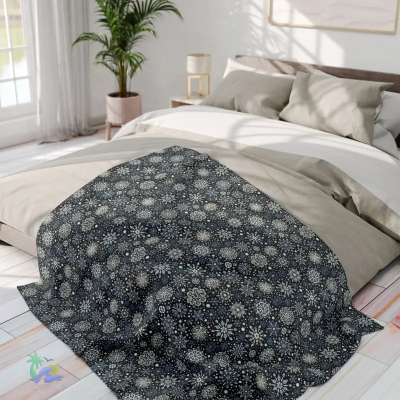 Black and white floral patterned blanket.