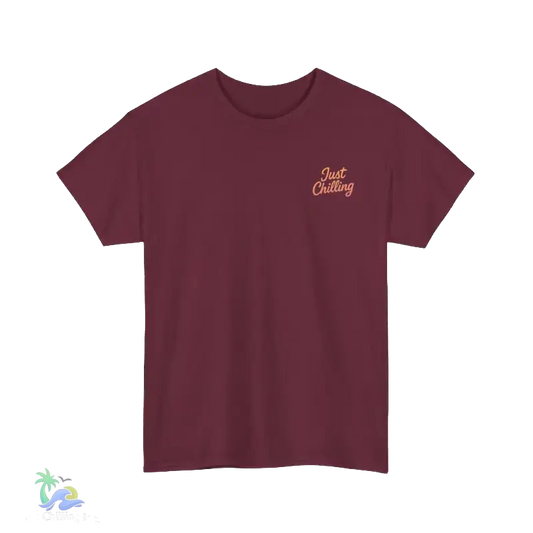 A maroon t-shirt with a small embroidered logo on the left side that says "Just Chilling".