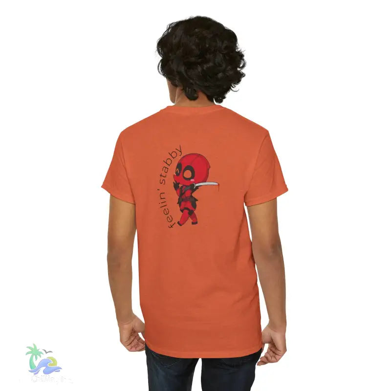 Orange t-shirt with Deadpool graphic.