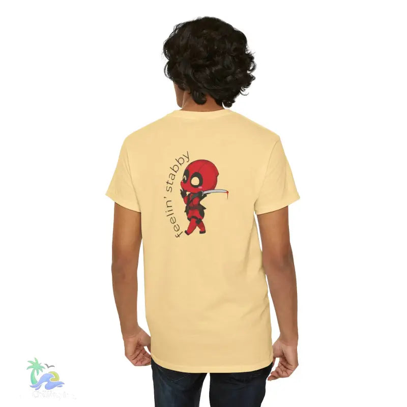 Yellow t-shirt with Deadpool graphic.