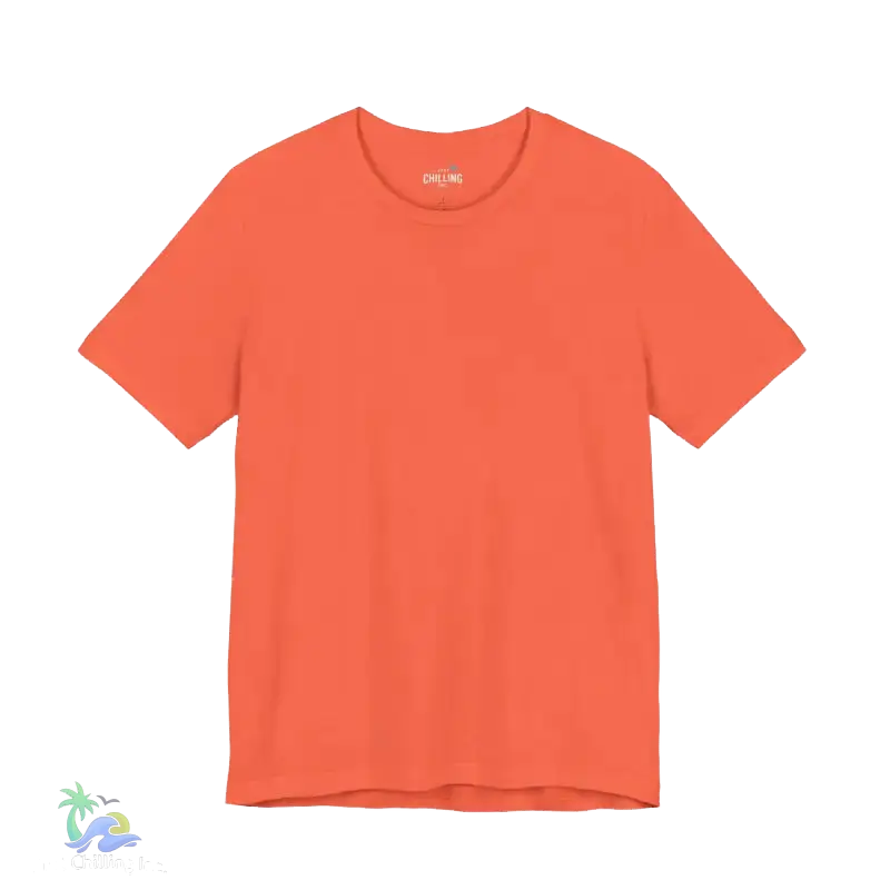 A bright orange t-shirt is shown against a black background.