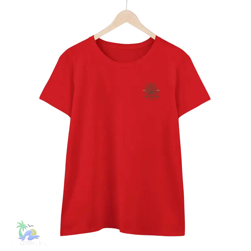 A red t-shirt hanging on a wooden hanger against a black background.