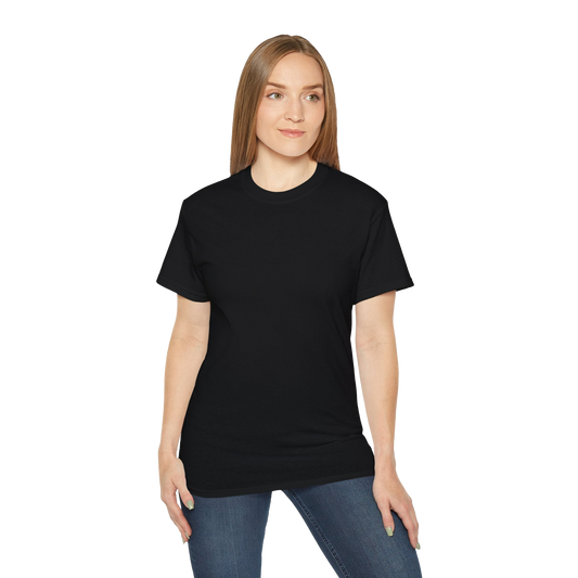 A woman with long blonde hair wearing a black t-shirt and blue jeans stands against a black background.