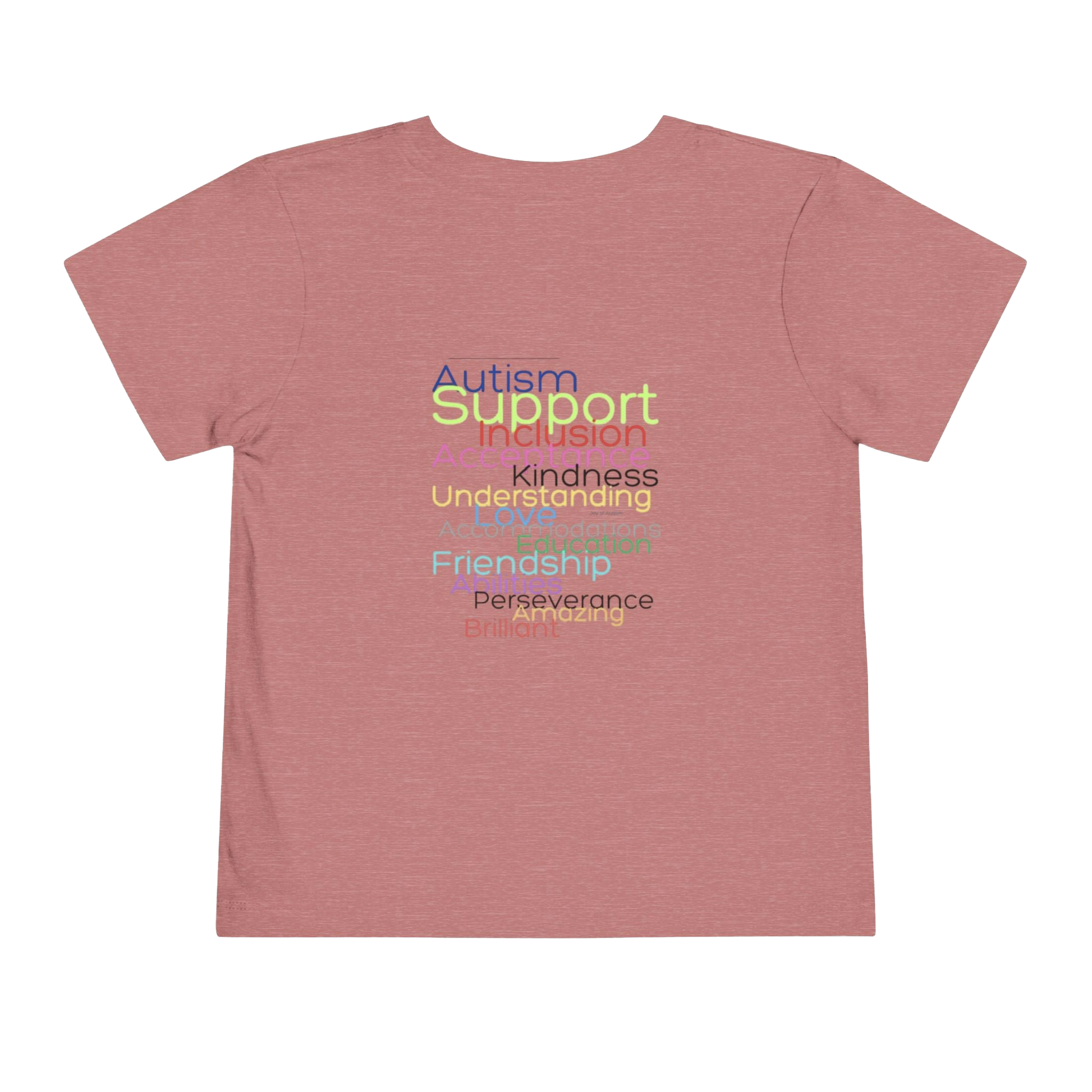 A pink t-shirt with the words "Autism Support" printed on it in a colorful, multicolored font.