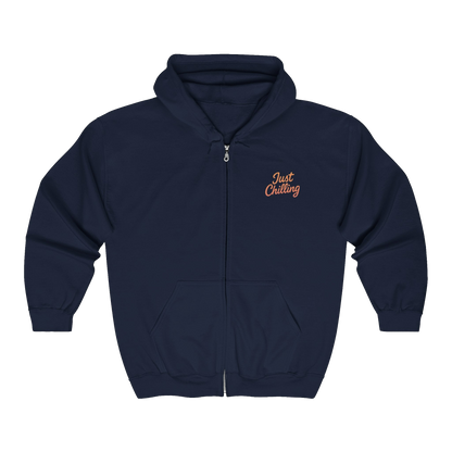 A navy blue zip-up hoodie with the text "Just Chilling" printed on the front.