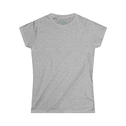 A plain, gray t-shirt is shown against a black background.