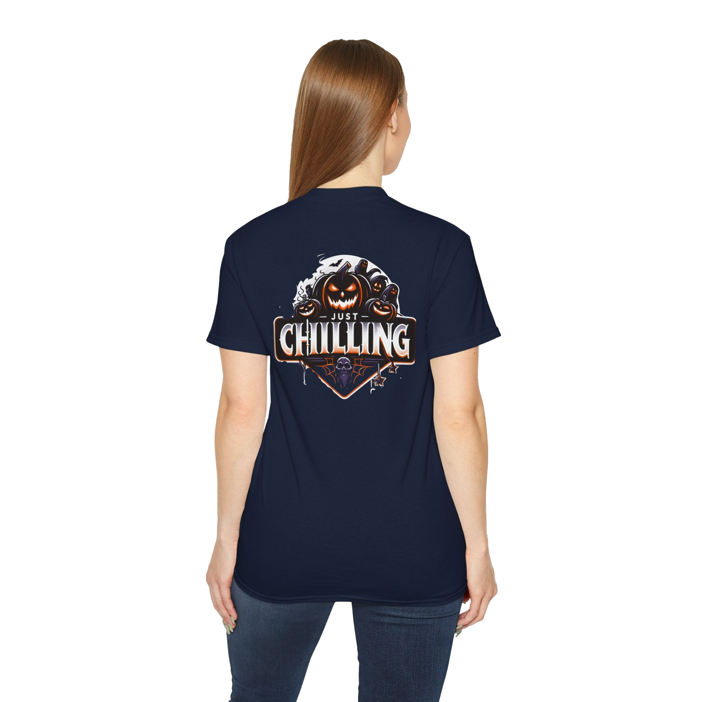 A woman wearing a navy blue t-shirt with a graphic design on the back.