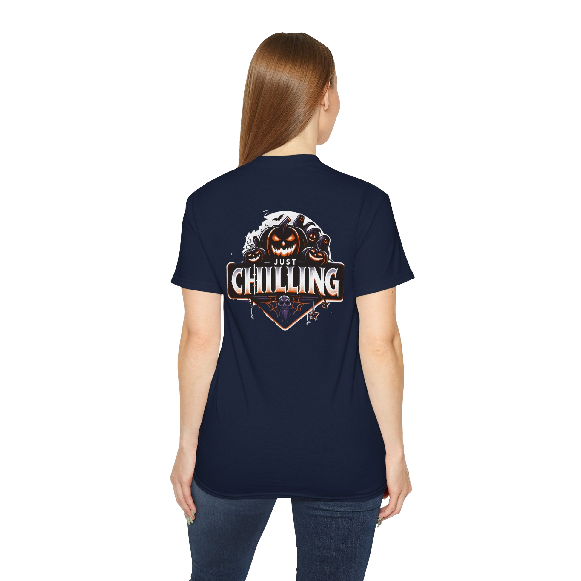 A woman wearing a navy blue t-shirt with a graphic design on the back.