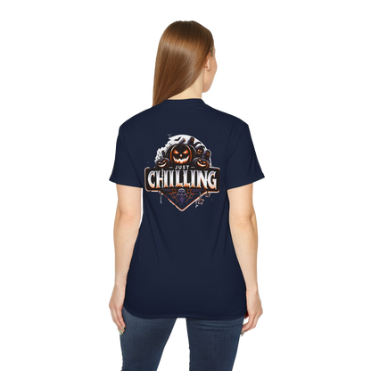 A woman wearing a navy blue t-shirt with a graphic design on the back.
