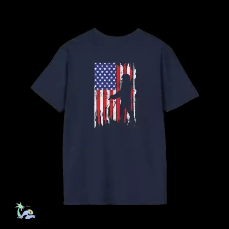 A navy blue t-shirt with a graphic design depicting a silhouette of a person in front of an American flag.