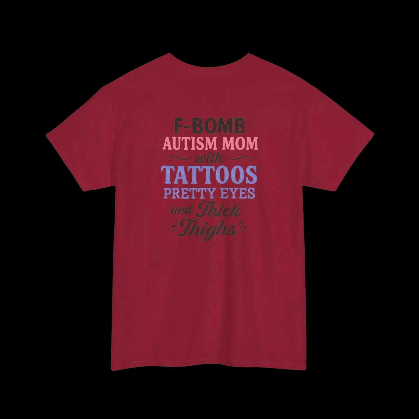 A red t-shirt with text that reads "F-BOMB AUTISM MOM with TATToos pretty eyes and Thighs".