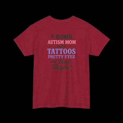 A red t-shirt with text that reads "F-BOMB AUTISM MOM with TATToos pretty eyes and Thighs".