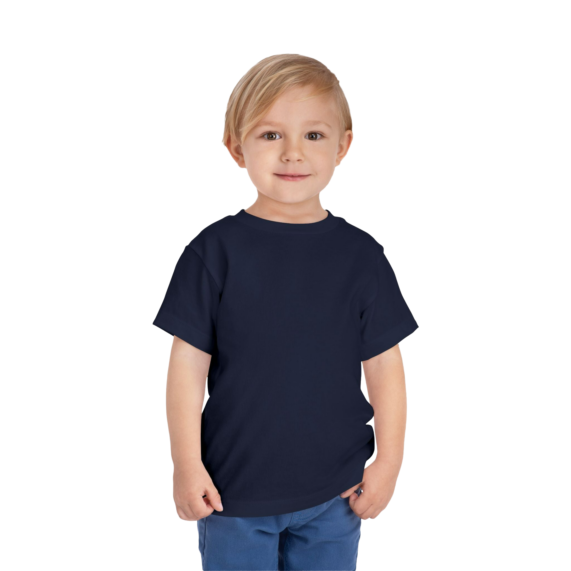 A young boy with blonde hair is smiling and standing against a black background.