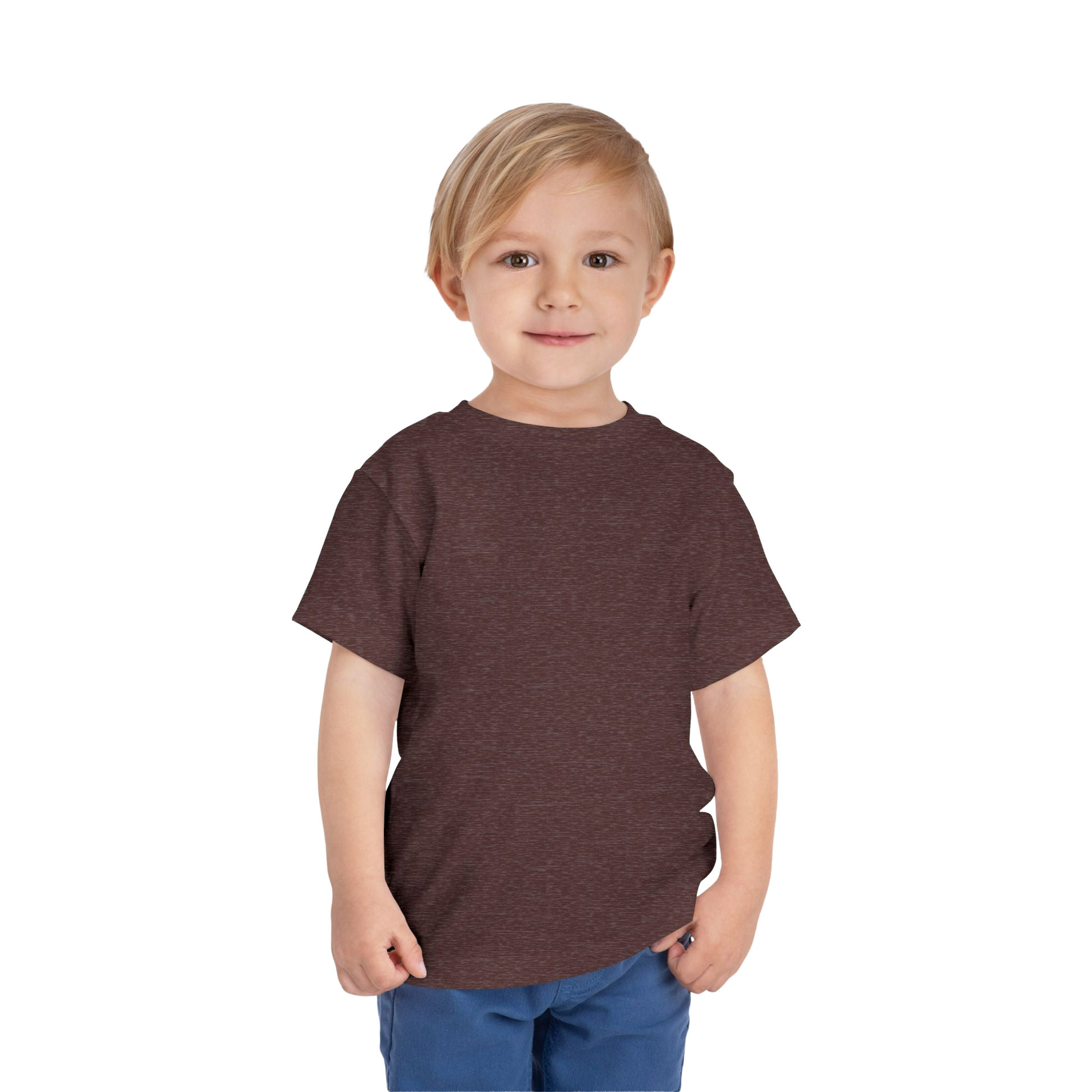 A young boy with blonde hair is smiling and standing against a black background.