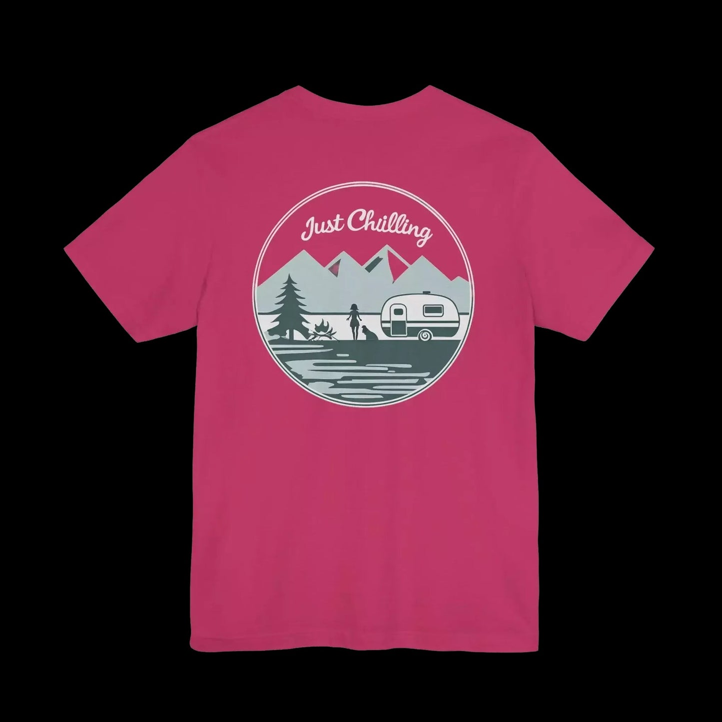 A pink t-shirt with a graphic design featuring a mountain landscape, a camper van, and the text "Just Challenging" in the center.