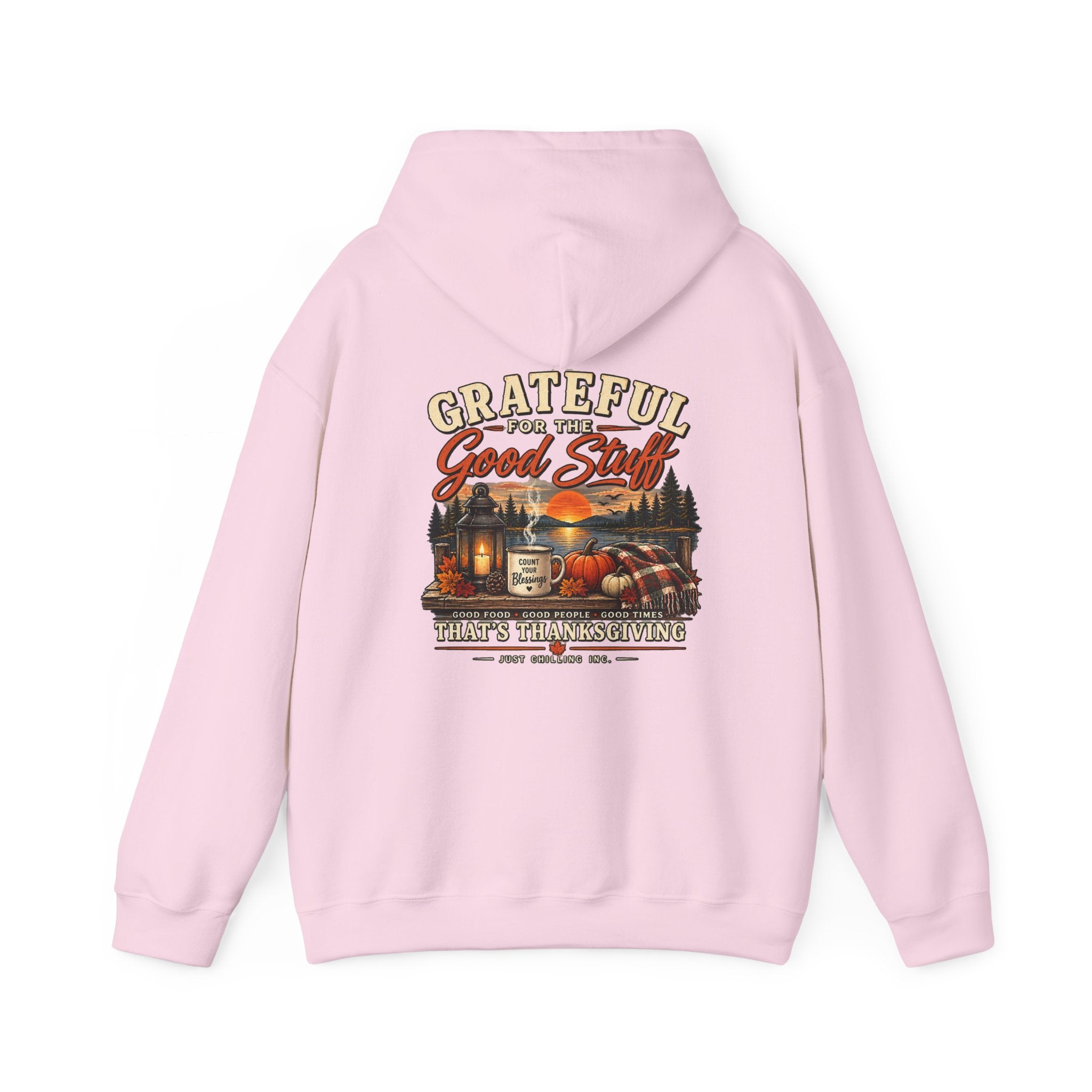 A light pink pullover hoodie shown from the back, featuring a large graphic print with the text 'Grateful for the Good Stuff' and a farm-themed illustration with a tractor, barn, and pumpkin.