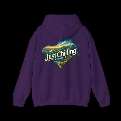 A purple hoodie with a graphic design on the back, featuring a scenic landscape with mountains and a body of water.