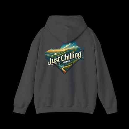 A grey hooded sweatshirt with a graphic design on the back, featuring a scenic landscape with mountains and a body of water.