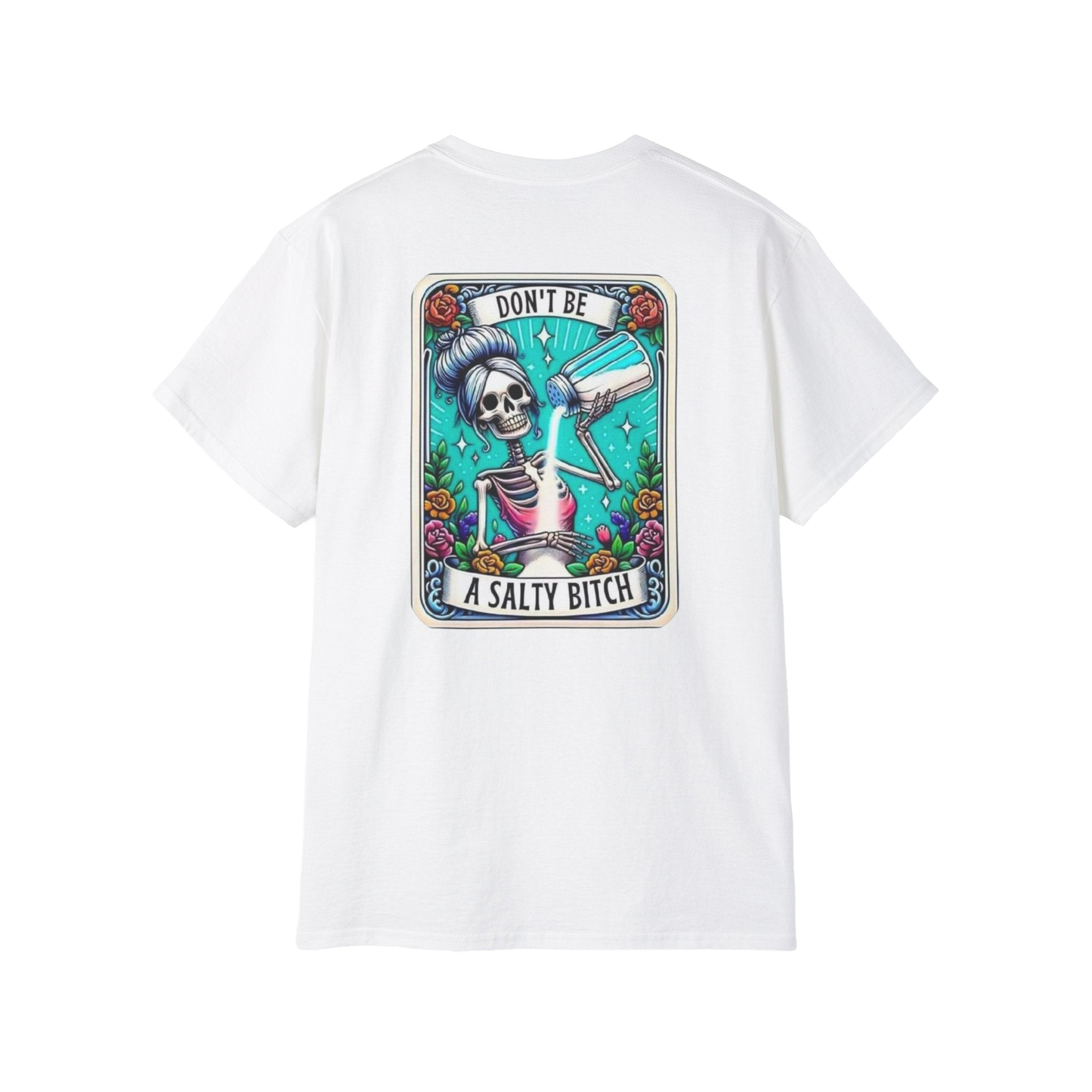 A white t-shirt with a graphic design featuring a skeleton wearing a sombrero and holding a bottle of alcohol, surrounded by colorful flowers and plants.