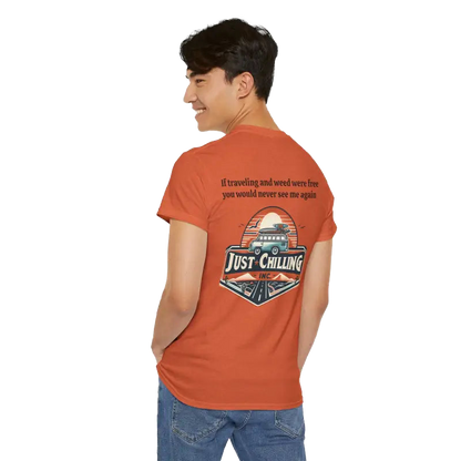 A person wearing an orange t-shirt with a graphic design and text on the back.
