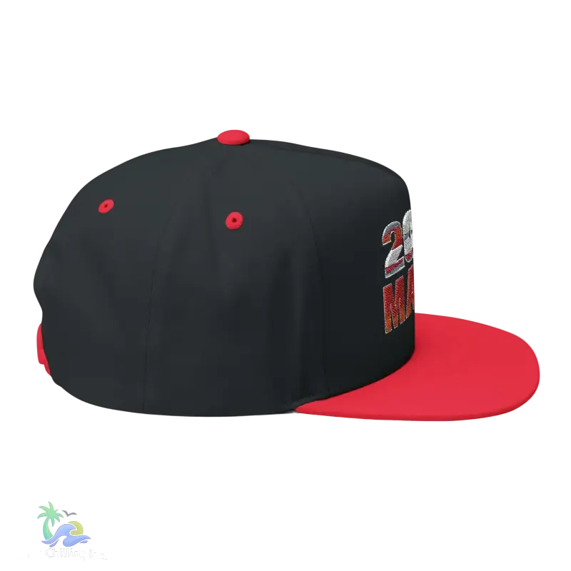 a black and red hat with a red visor