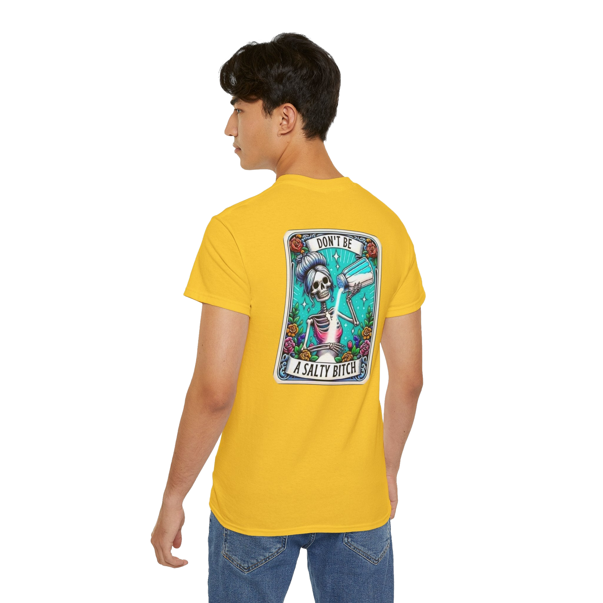 A person wearing a yellow t-shirt with a graphic design on the back.