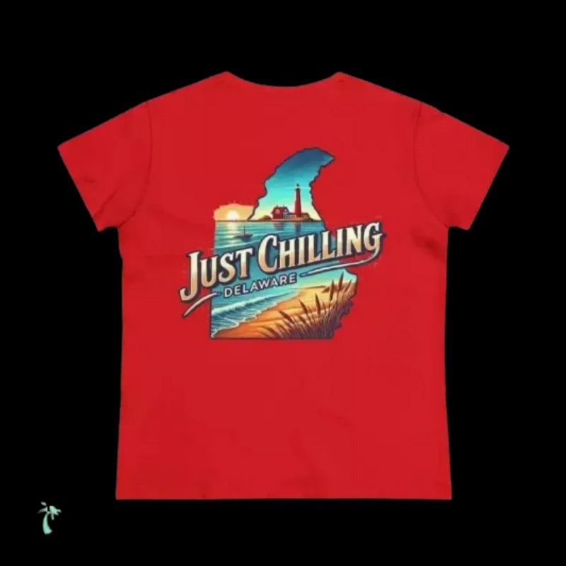 A red T-shirt with a graphic design depicting a beach scene and the text "Just Chilling Delaware" printed on it.