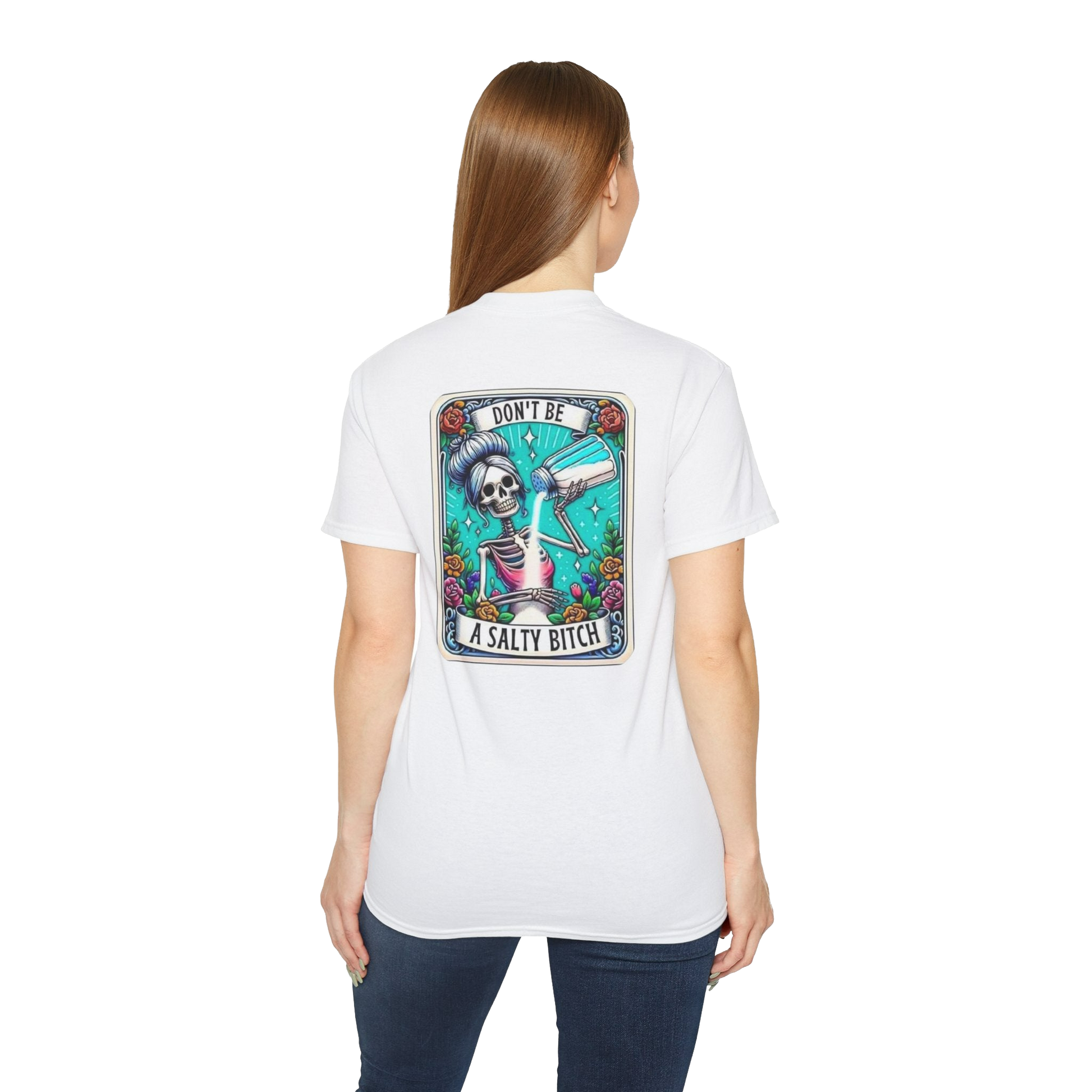 A woman wearing a white t-shirt with a graphic design on the back.