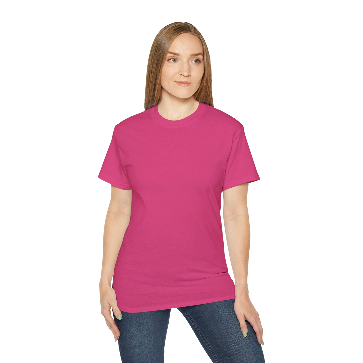 A woman wearing a pink t-shirt and blue jeans stands against a black background.
