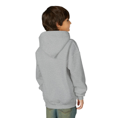 A young boy wearing a gray hooded sweatshirt stands facing away from the camera.