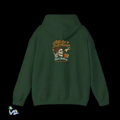 A green hoodie with a graphic design on the back.